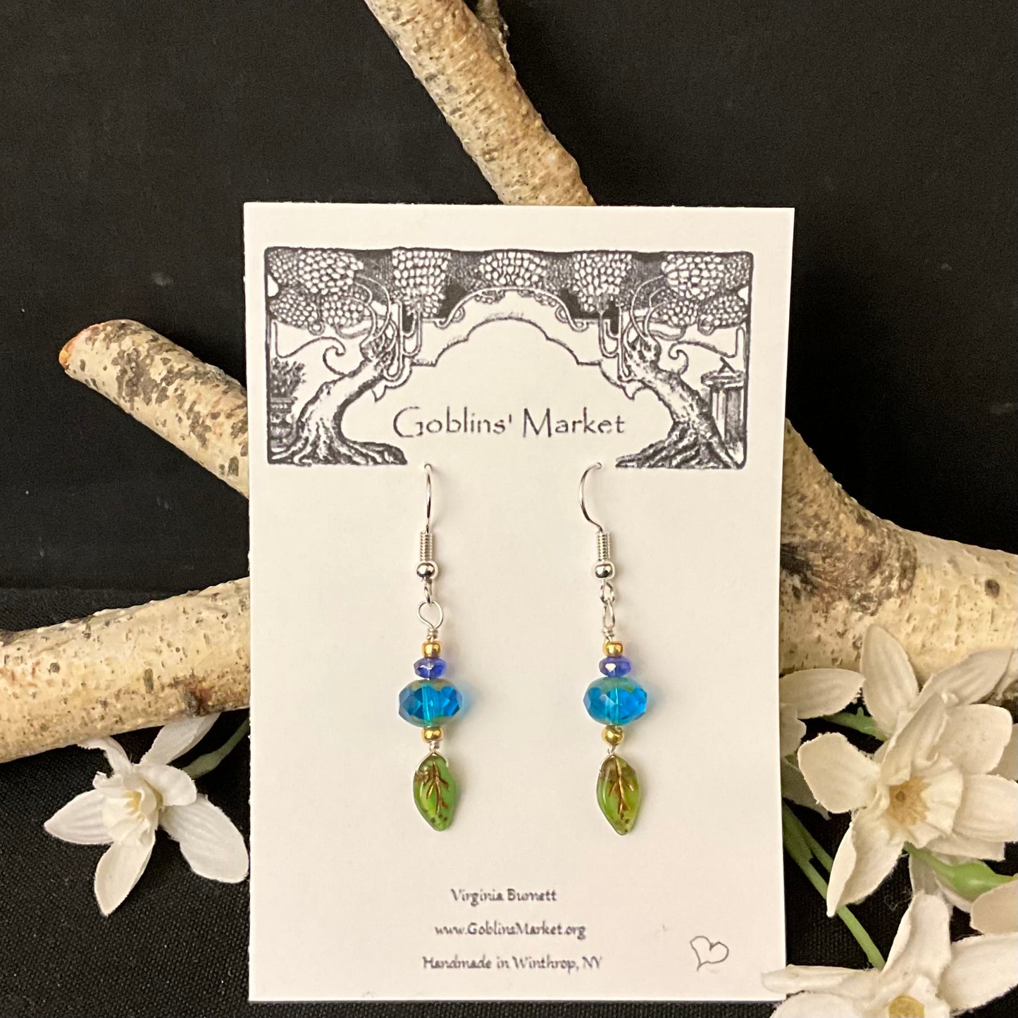 Earrings with Cyan Blue rondelles and green leaves