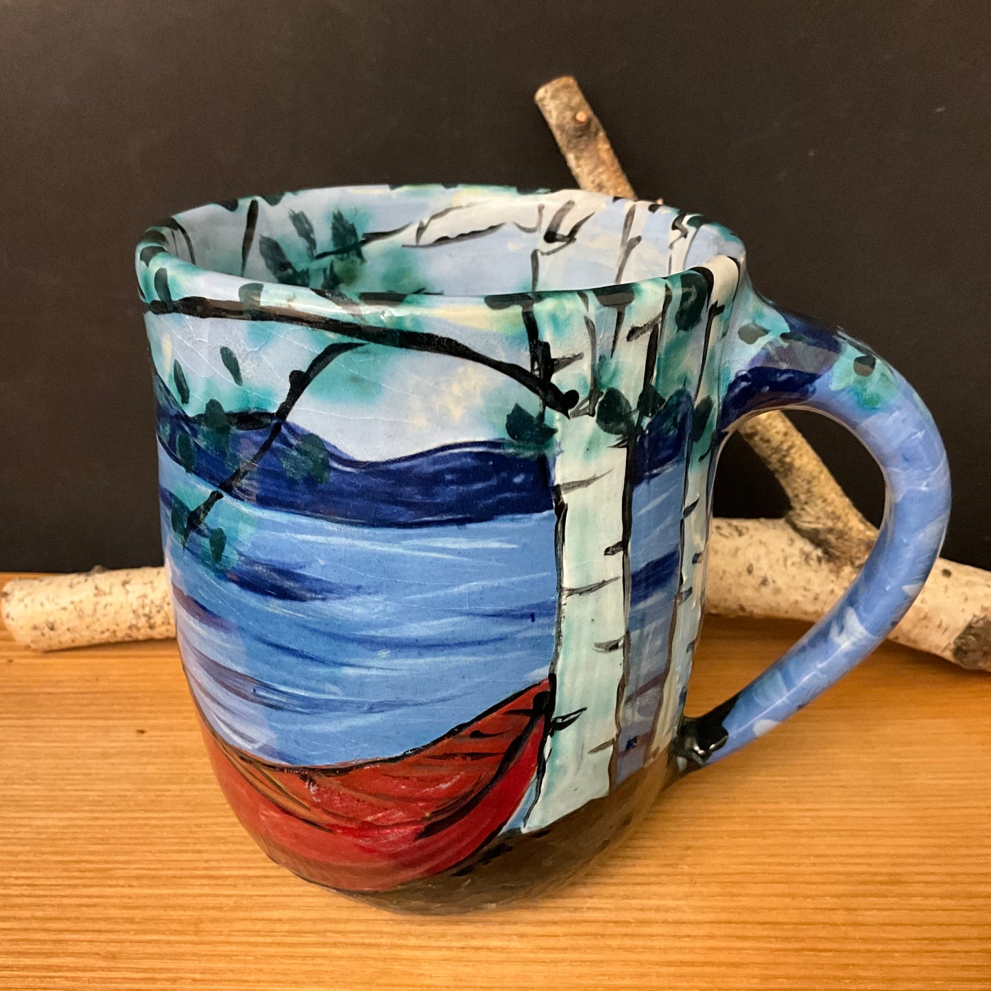 Mug with Carved Red Canoe and Birch Tree