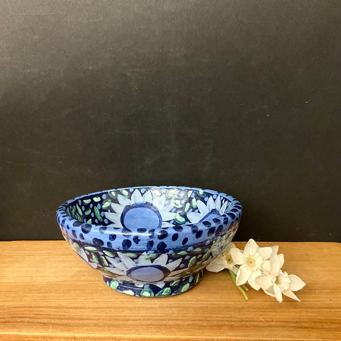 Petite Black Bowl with Large Overall Blue Flower Design