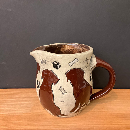 Small Pitcher with Carved Brown Dogs