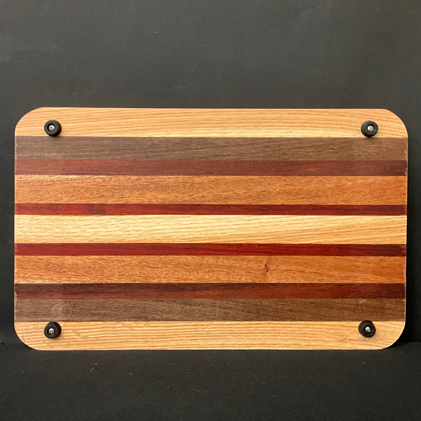 Inlaid Wood Cutting Board with Feet, mixed hardwoods