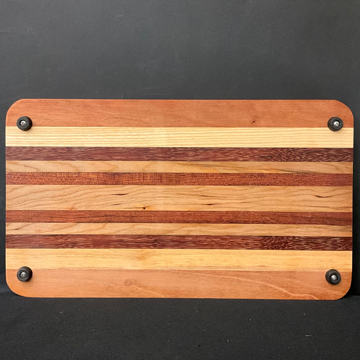 Inlaid Wood Cutting Board with Feet, mixed hardwoods