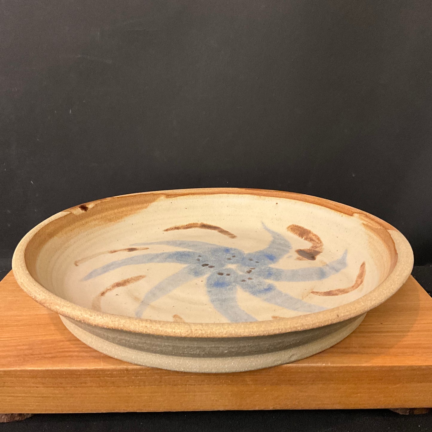 Tan Serving Dish with Blue Spin Design