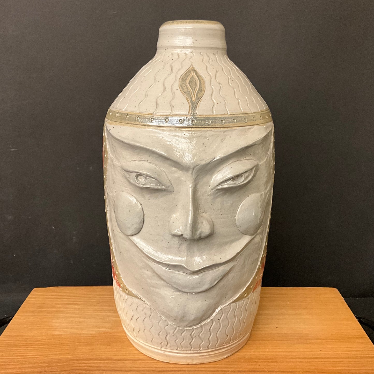 Pale Face Jug with Rust Orange Details