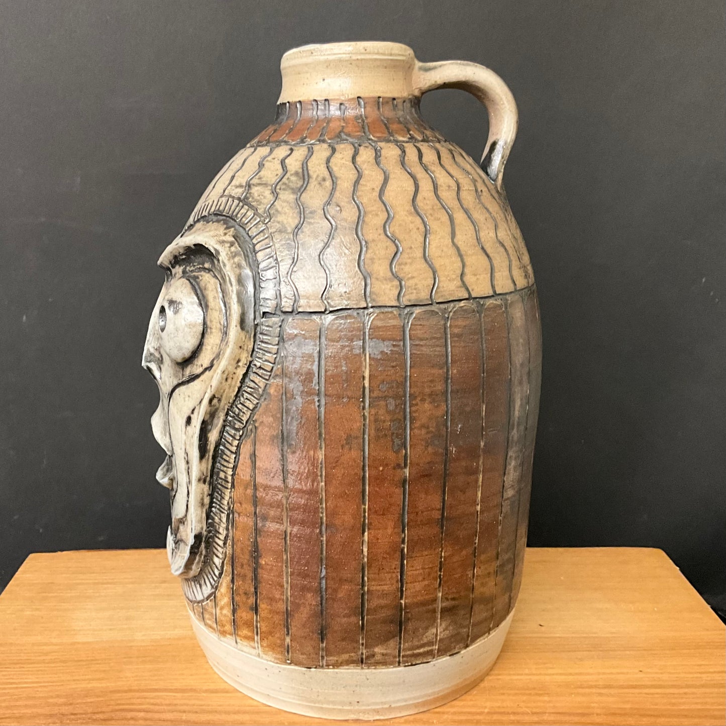 “Surprised Alien” Face Jug with Brown Details