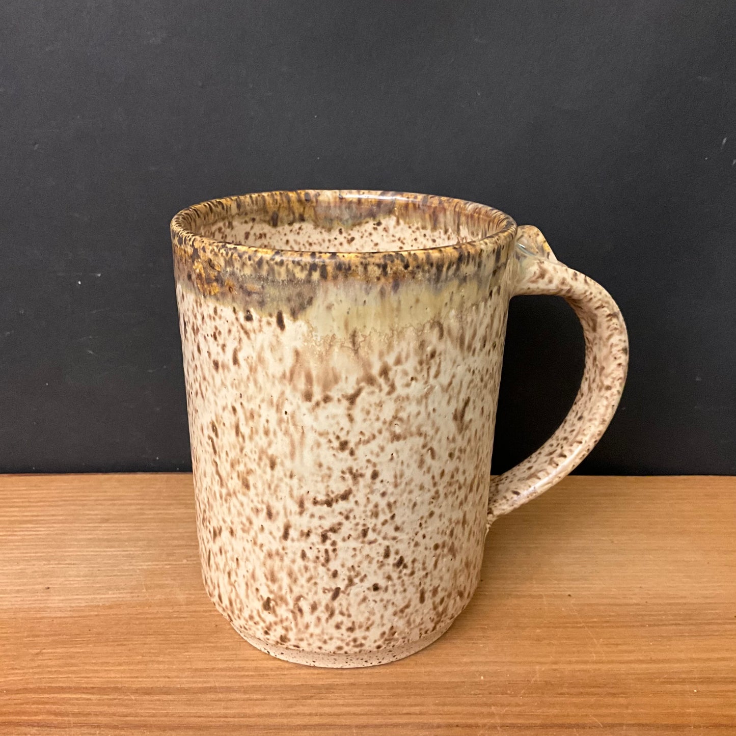 Mug in Speckled Cream with Brown Rim