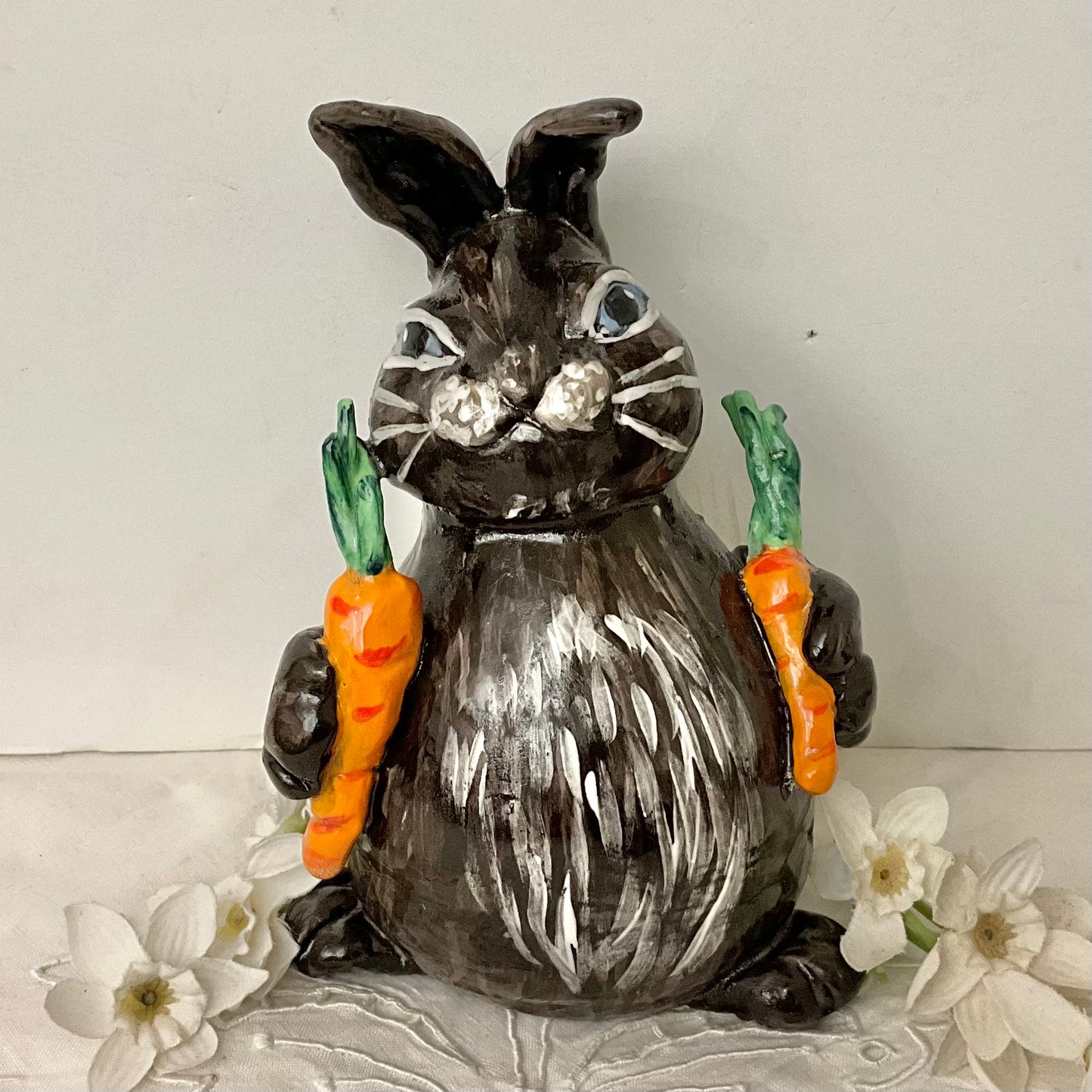 Dark Brown Bunny with Two Carrots