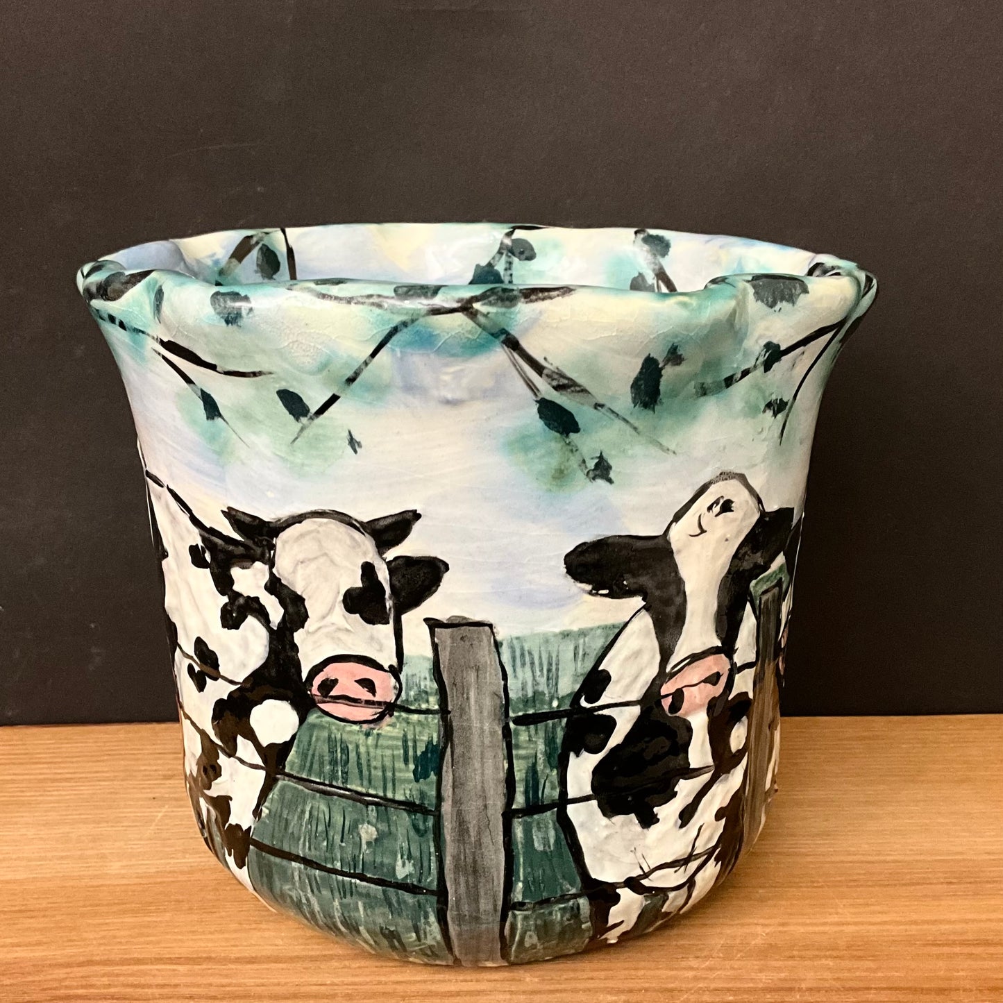Crock with Holsteins on a Fence