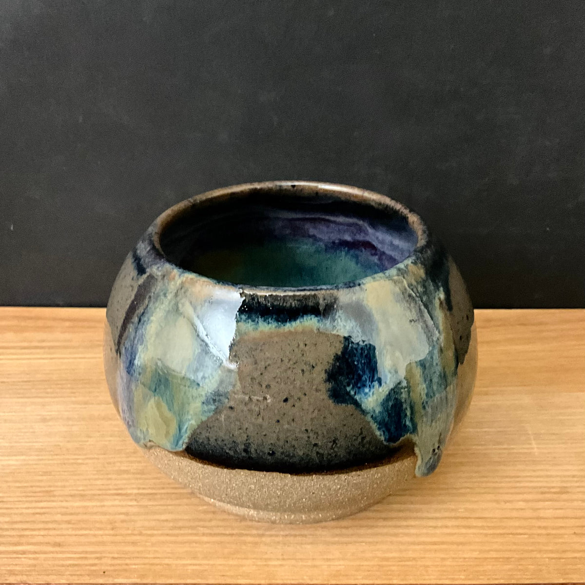 Small Bowl with Blue Drip Glaze on Brown