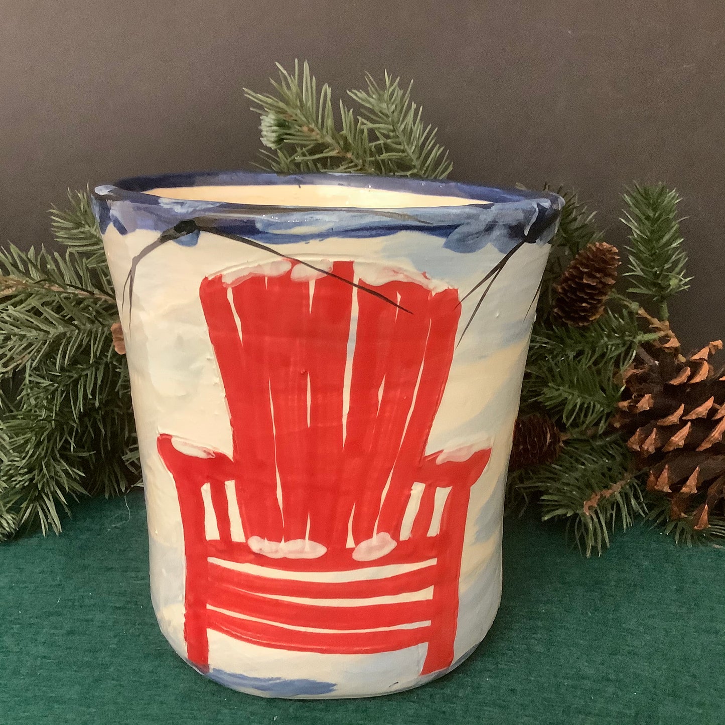 Crock Winter Scene with Red Adirondack Chairs