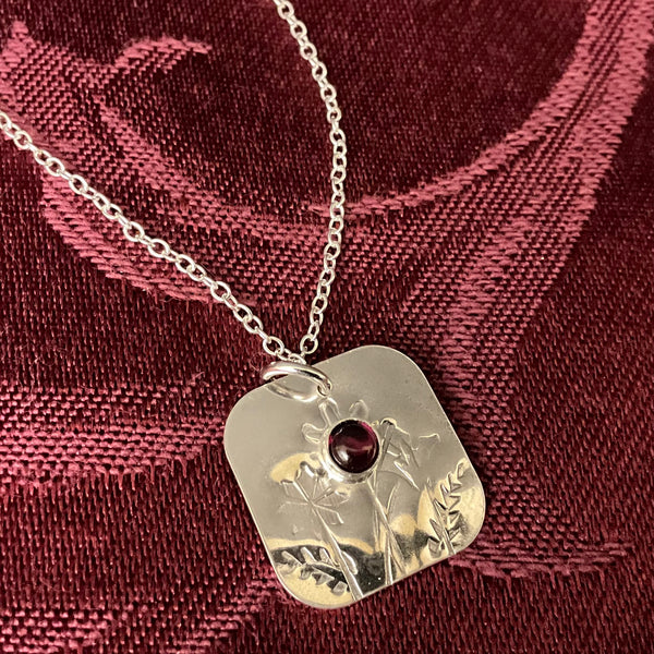 3/4” Stamped Square Pendant with Garnet