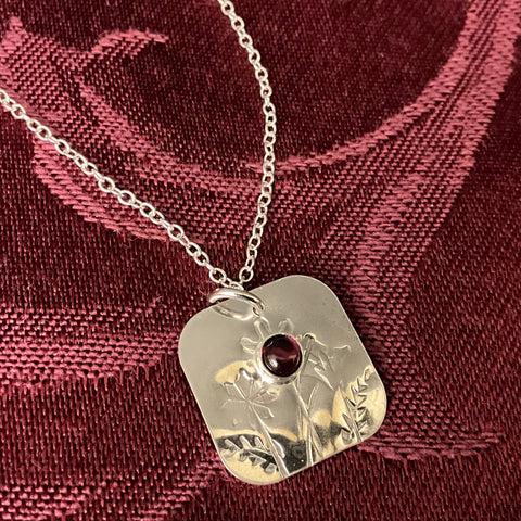 3/4” Stamped Square Pendant with Garnet