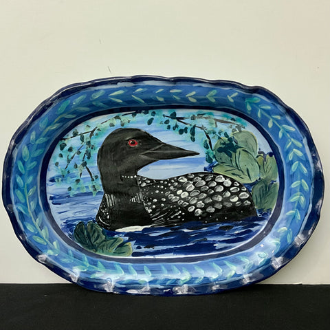 Blue oval serving platter with loon