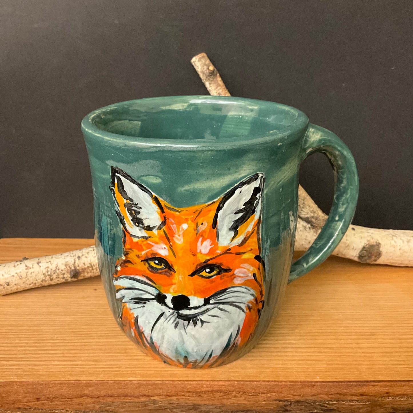 Mug with Carved Fox Heads