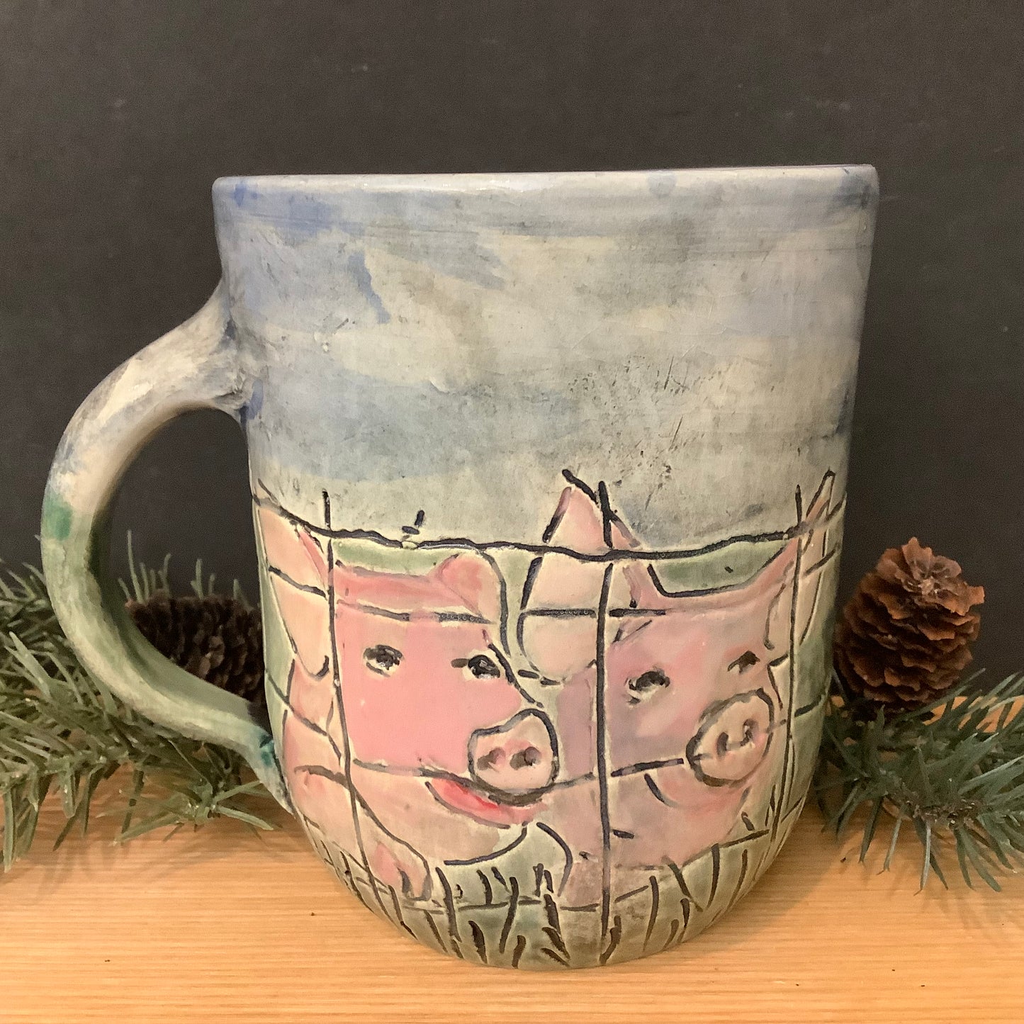 Mug with Carved Pigs