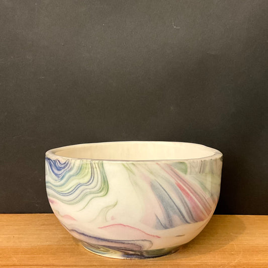 Small Porcelain Slip Bowl with Pastel Swirl Design