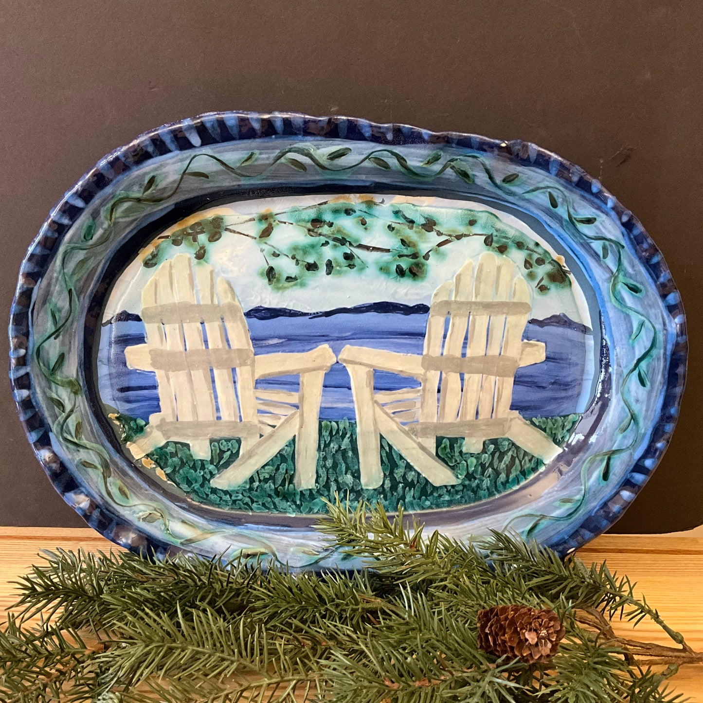 Oval Blue Plate with White Adirondack Chairs