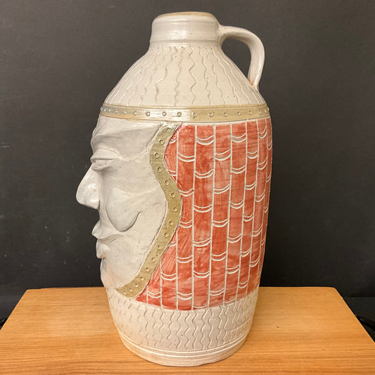 Pale Face Jug with Rust Orange Details