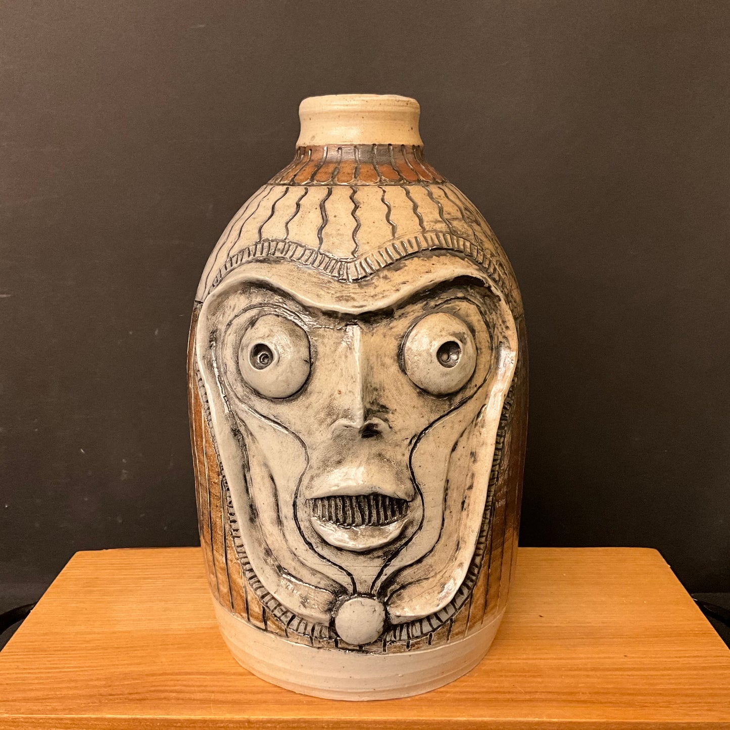 “Surprised Alien” Face Jug with Brown Details
