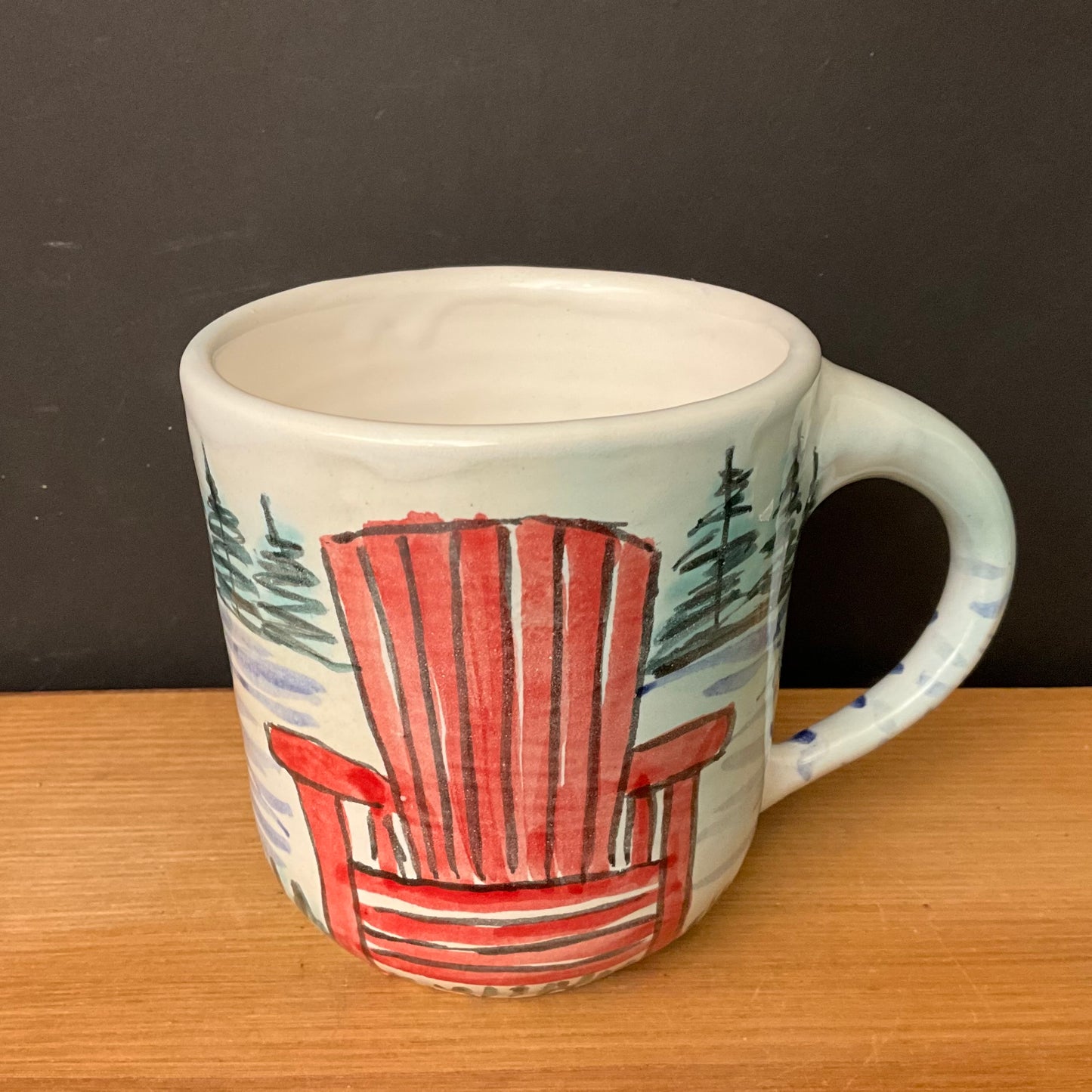 White Mug with Red ADK Chair, Water and Trees