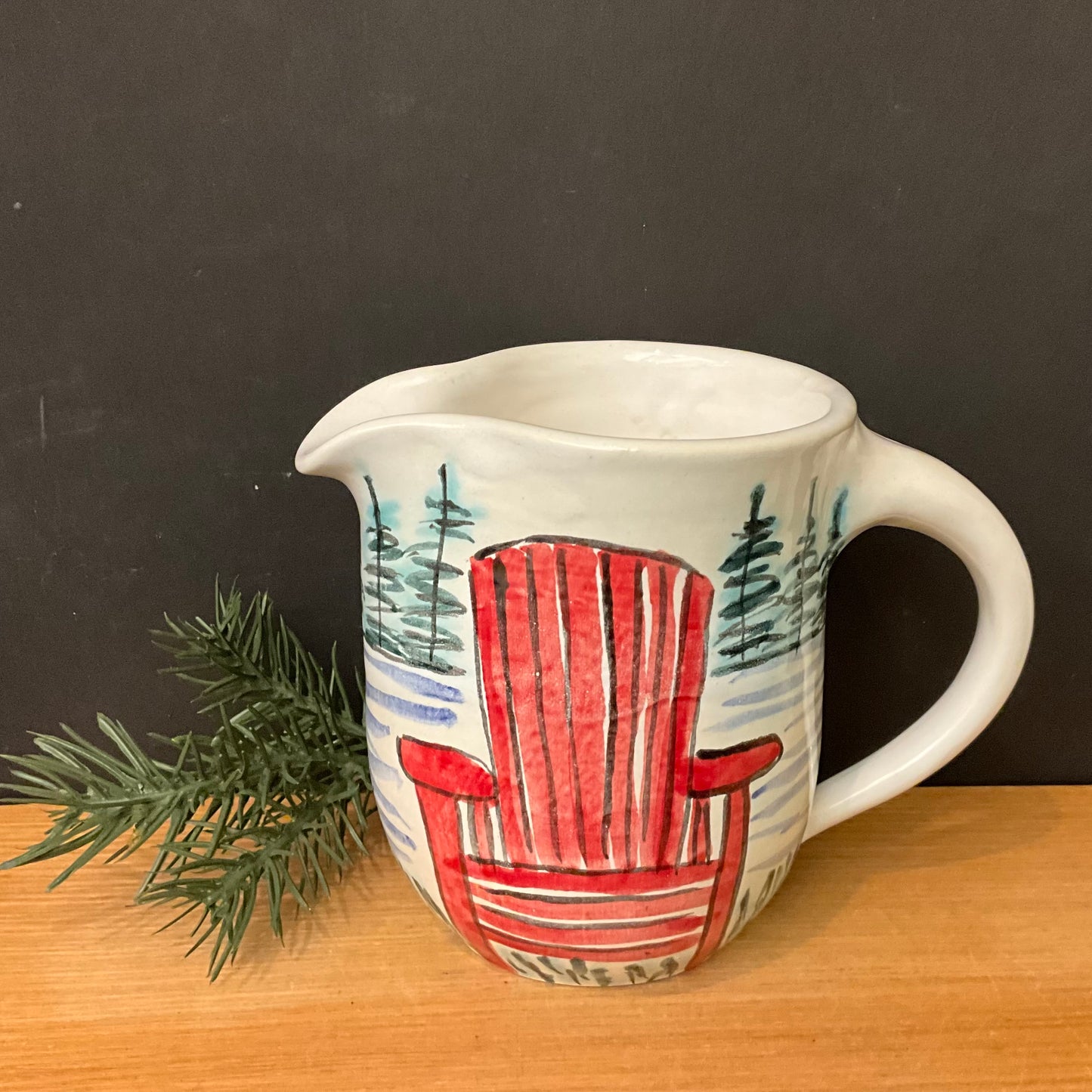 Small  Pitcher with Red Adirondack Chairs, Water & Trees