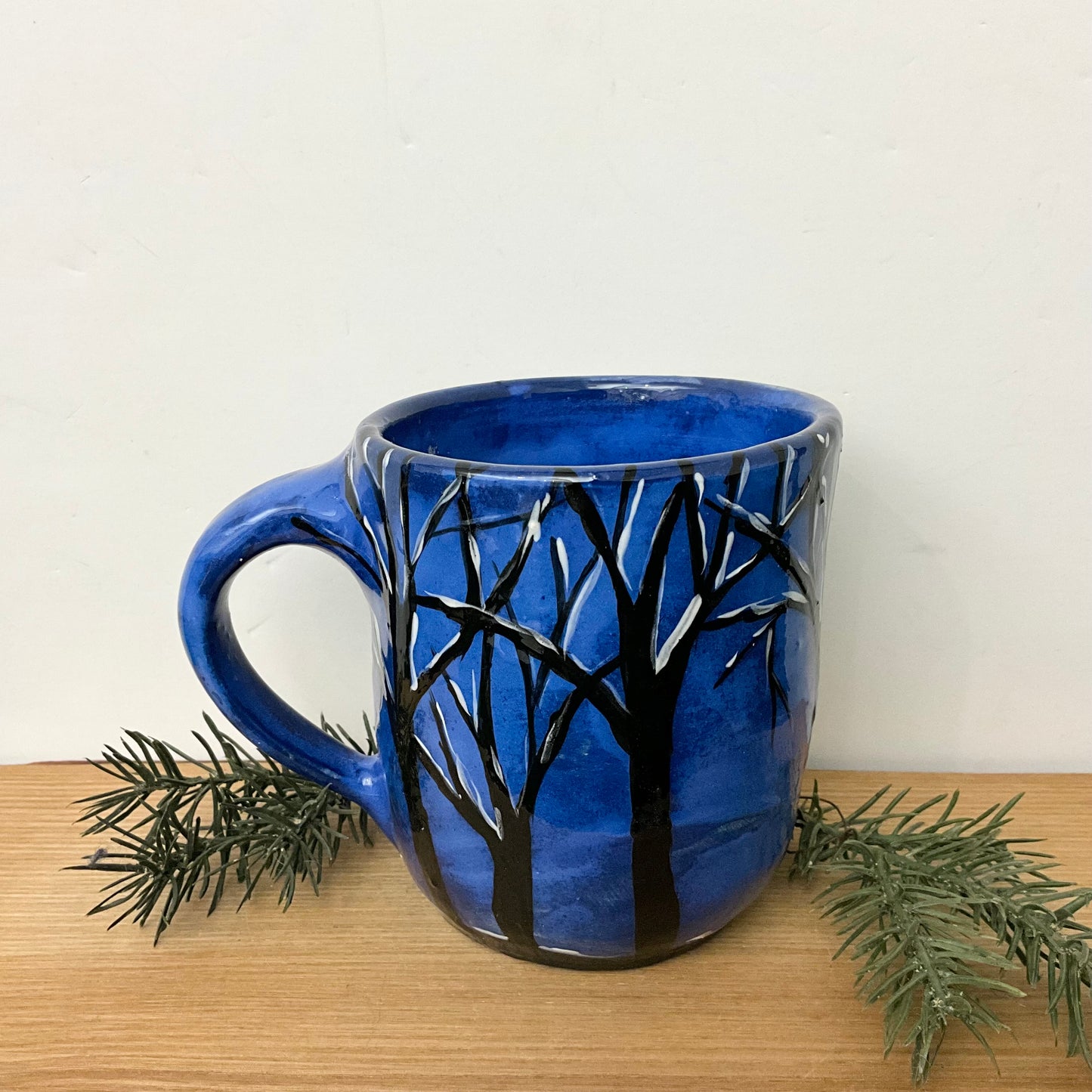 Mug with Winter Trees on Dark Blue Background