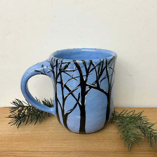 Mug with Winter Trees on Light Blue Background
