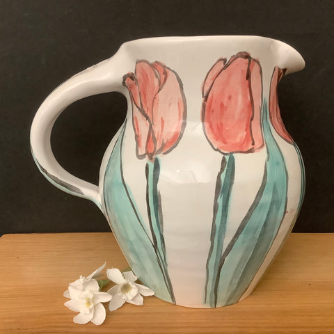 White Pitcher with Pale Red Tulips
