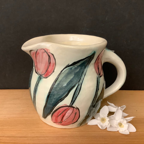 Petite White Pitcher with Pale Red Tulips