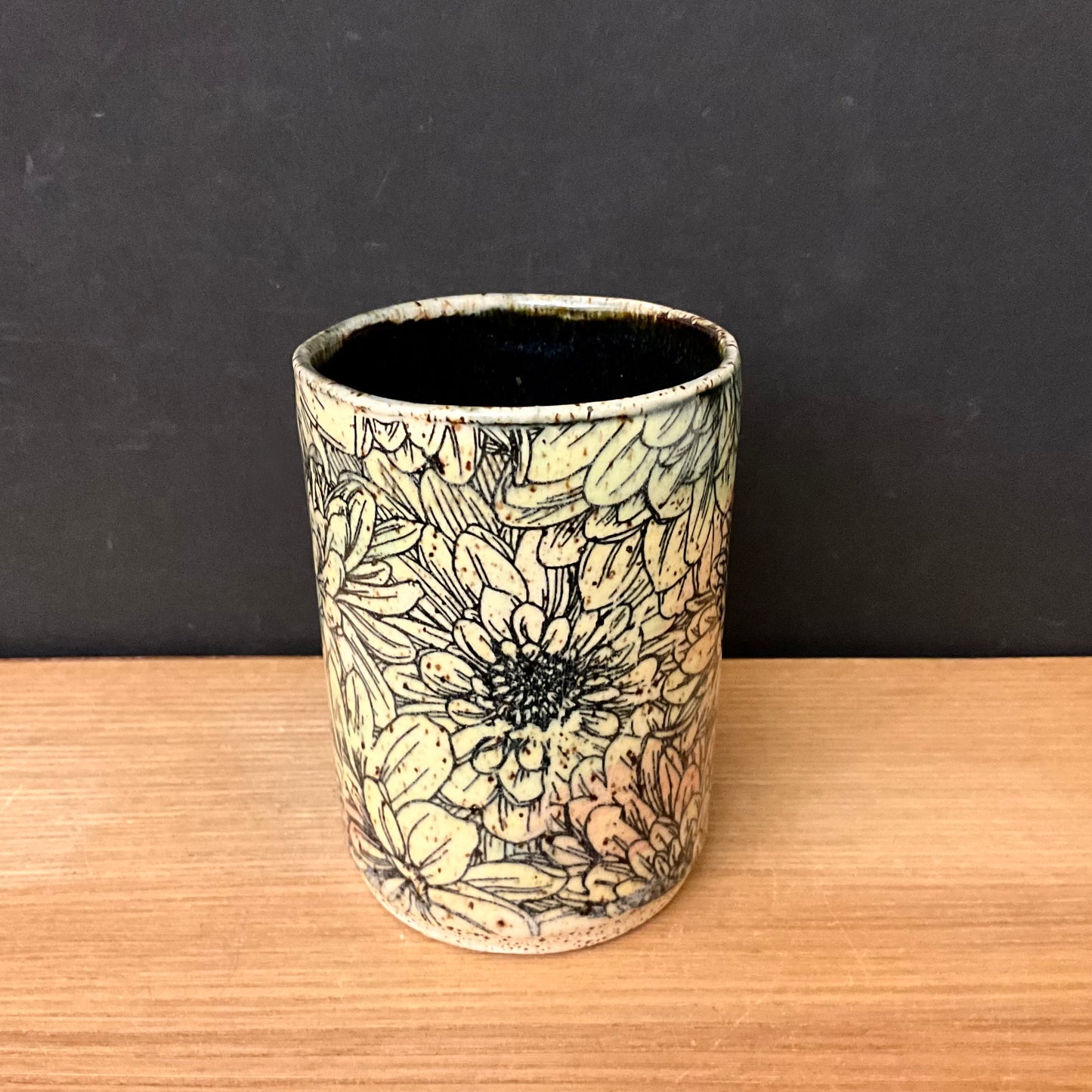 Tumbler with Muted Red Green  Chrysanthemum design with Black Interior