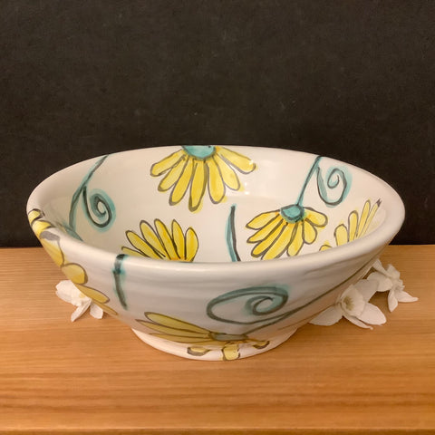 Small White Bowl with New Yellow Flowers