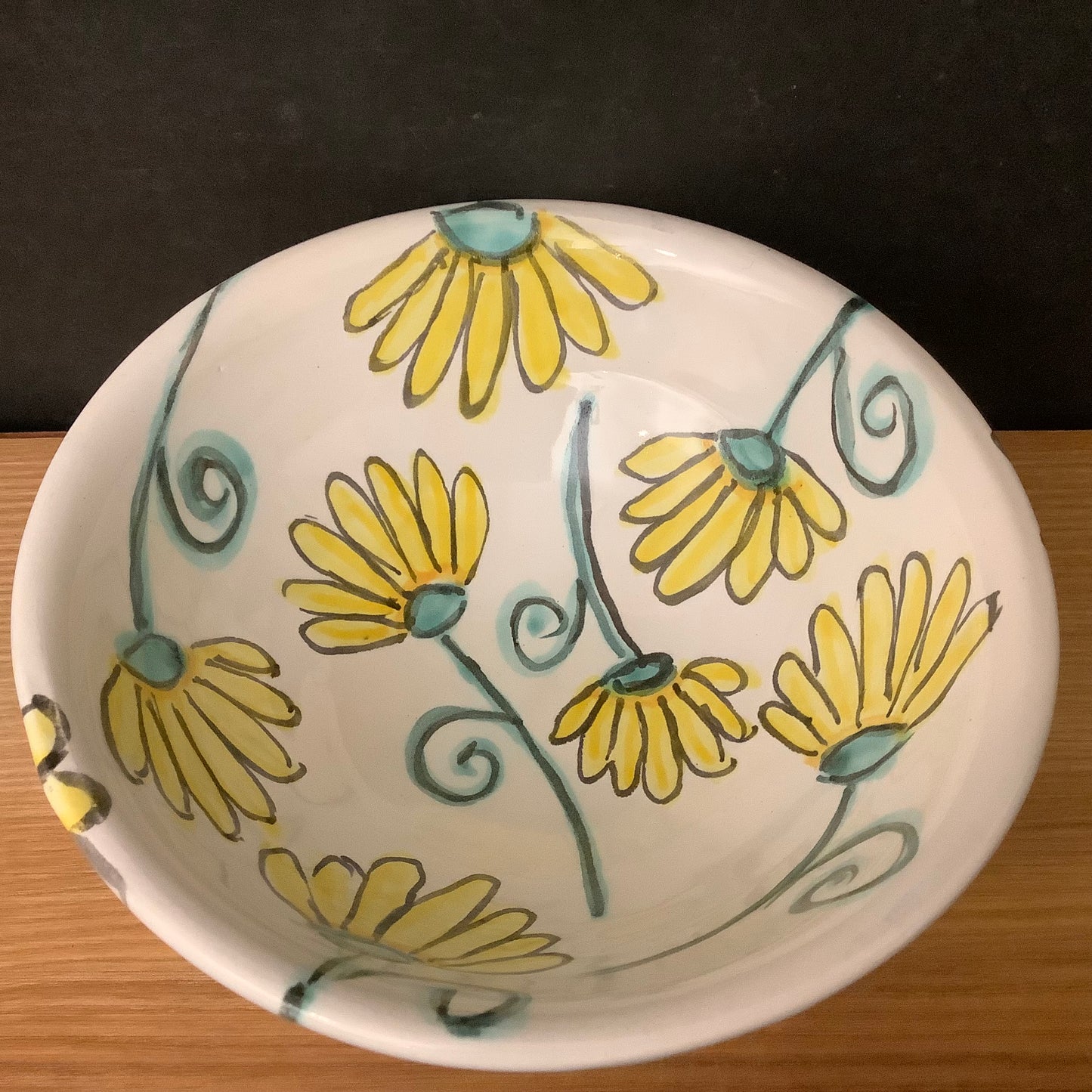 Small White Bowl with New Yellow Flowers