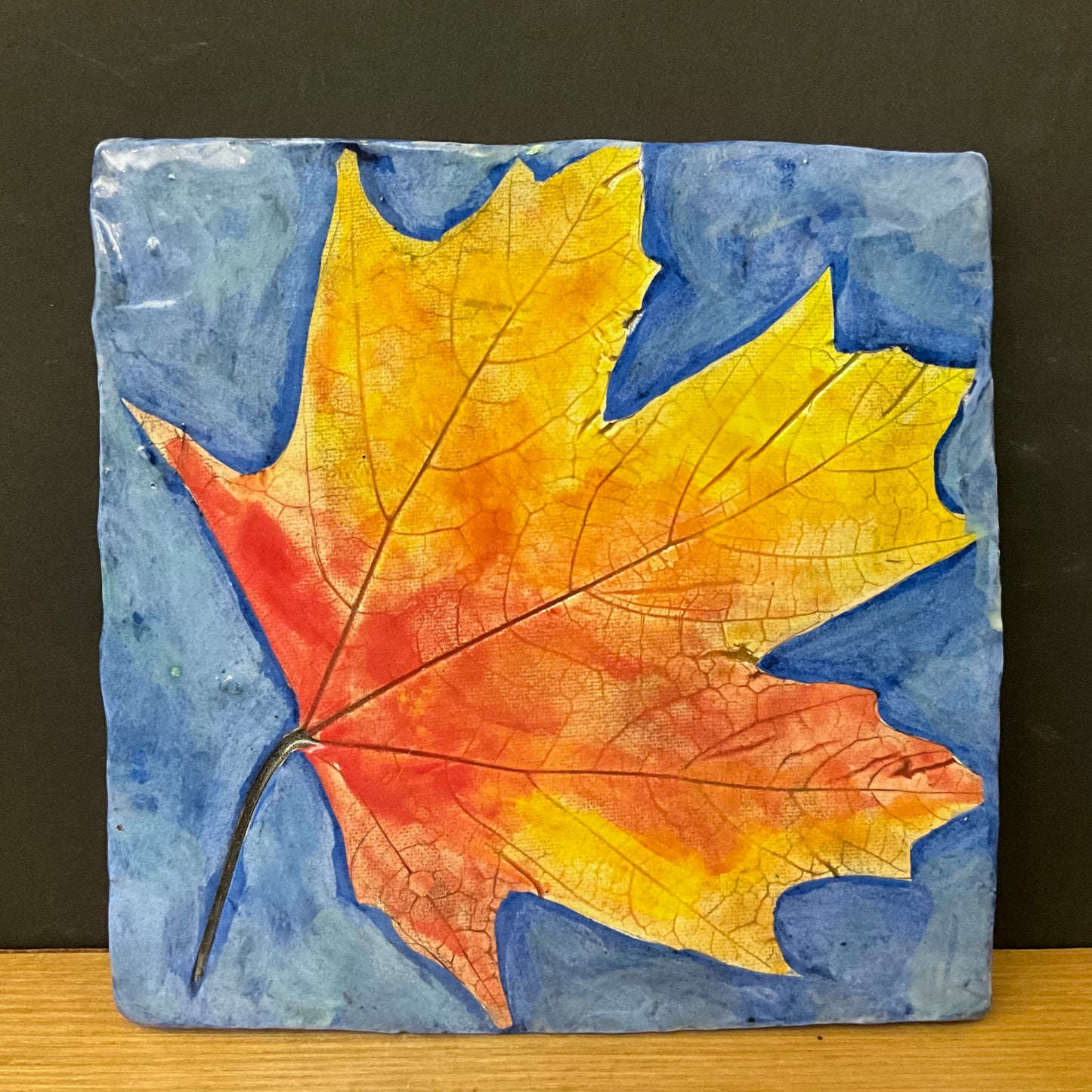 Trivet Maple Leaves in Fall Colors on Bright Blue