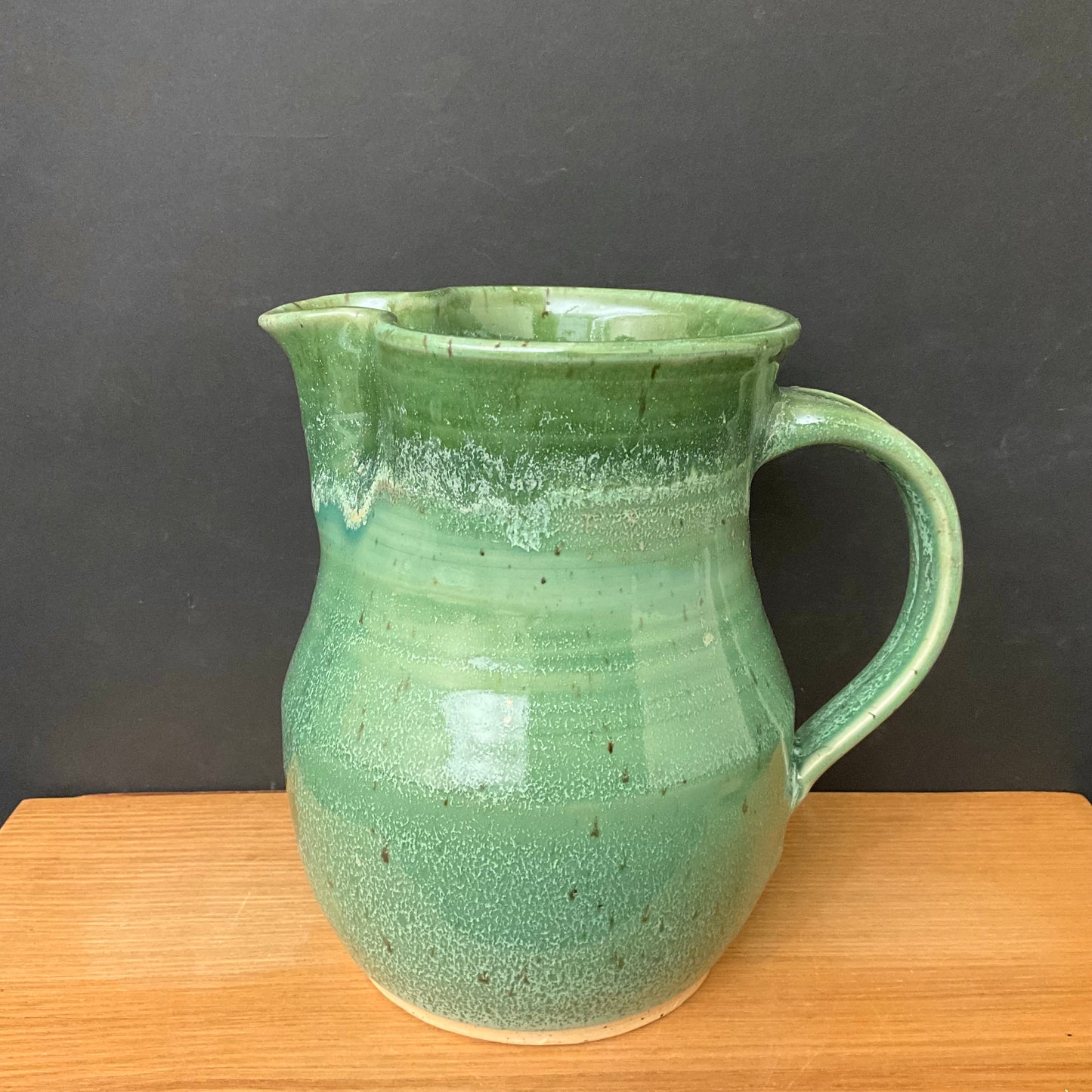 Tall Green Pitcher