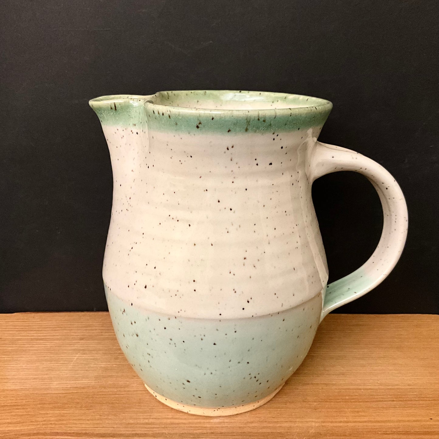 Elegant White Pitcher with Pale Green Bands
