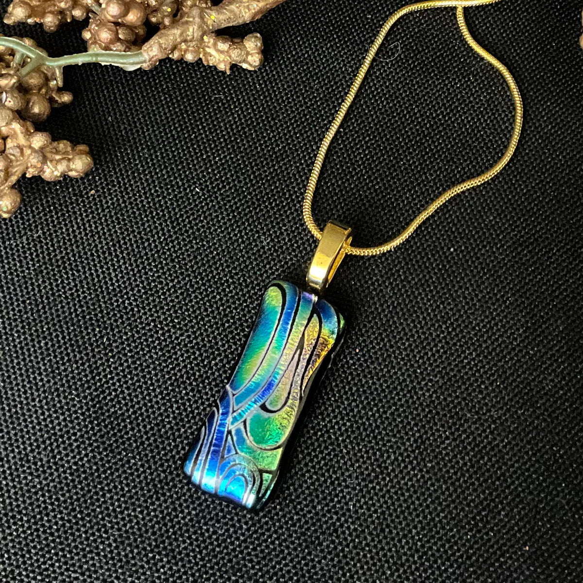 Fused Glass Pendant in Black with Iridescent Flow Pattern