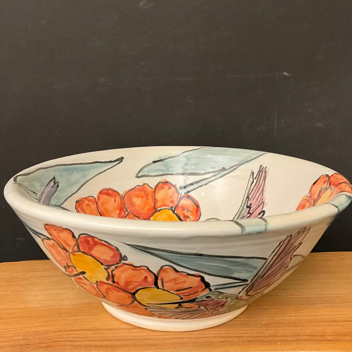 Bowl with Hummingbirds and Orange Flowers