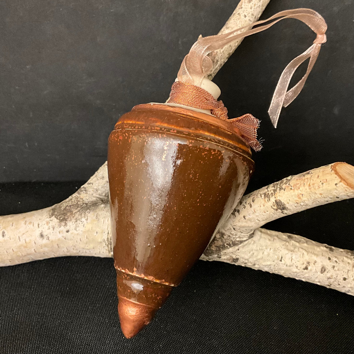 Ceramic “Top” Shaped Ornament in Browns