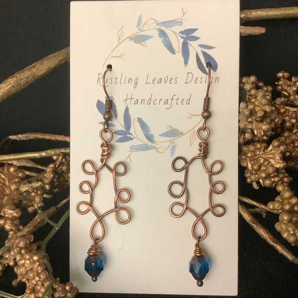 Copper Squiggles w/ bright blue bead Earrings