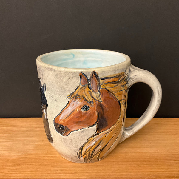 Mug with 3 Carved Horses