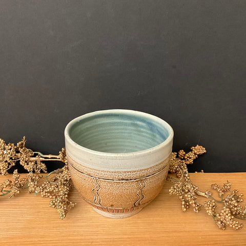 Tan & orange Salt Glazed Tea Bowl with stripes & squiggles