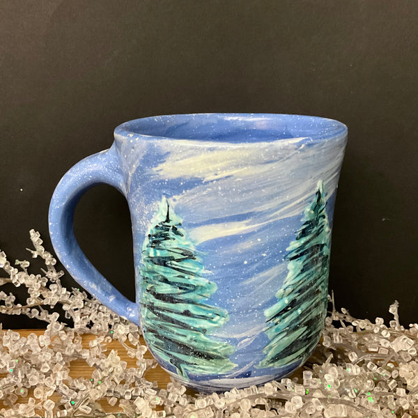 Snowy Trees Mug on Blue