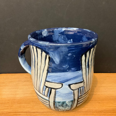 Dark Blue Carved Mug with White Adirondack Chairs