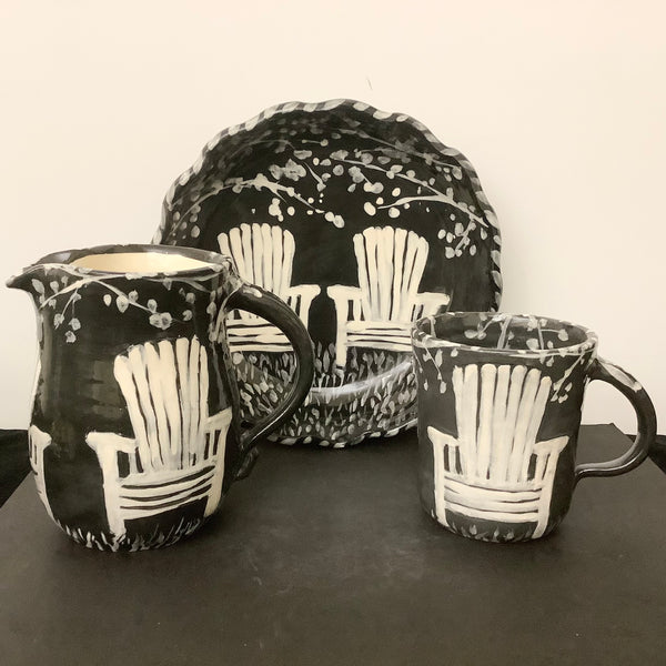 Black Mug w White Adirondack Chairs