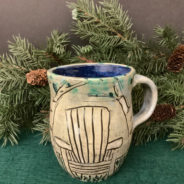 Carved Mug with White Adirondack Chairs