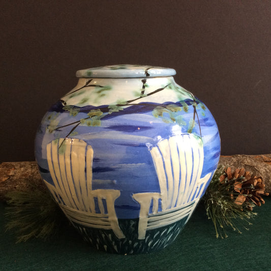 Medium covered jar with white Adirondack chairs